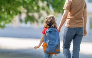 parent walking with child