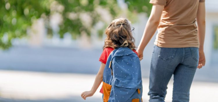 parent walking with child