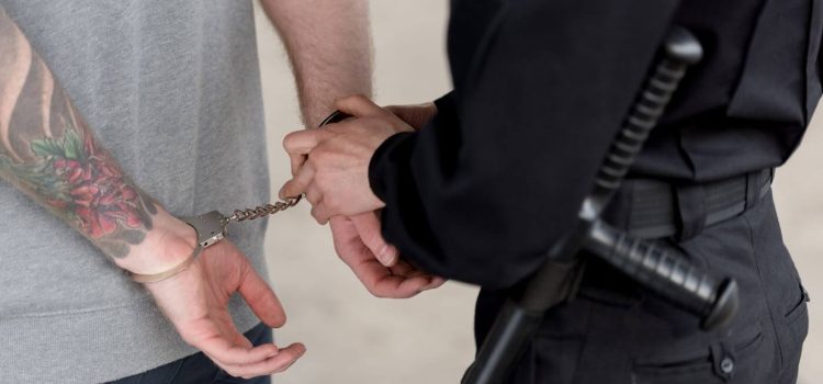 cropped-shot-of-policewoman-with-truncheon-handcuf-2022-12-16-16-36-41 (1)