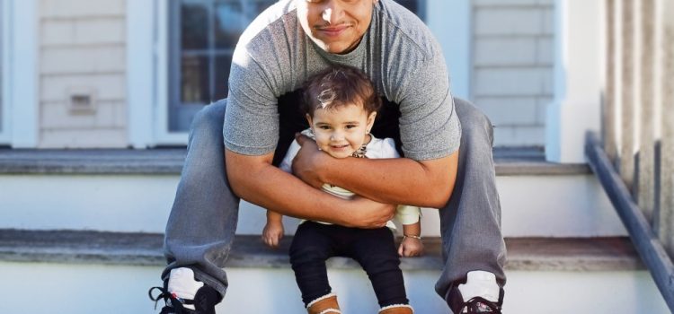happy-hispanic-dad-and-daughter-sharing-a-loving-moment-outside-on-the-steps-of-their-house_t20_BEBYeY